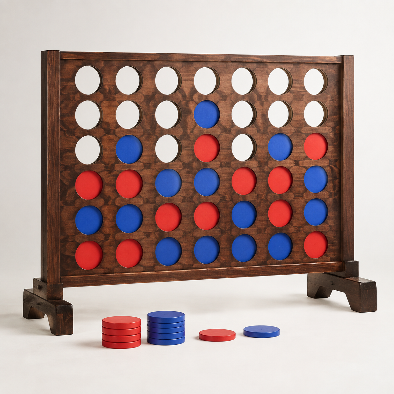 Oversized red and blue Connect Four lawn game